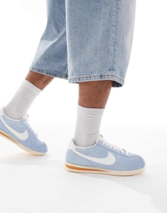 Nike Cortez trainers in sail and orange