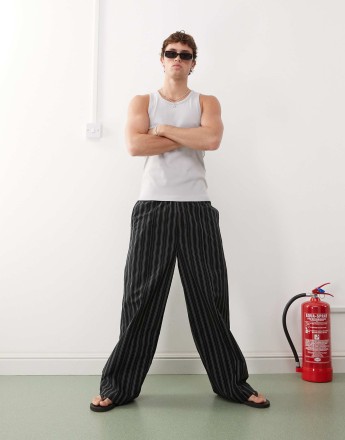 Weekday loose fit trousers in black and beige stripe