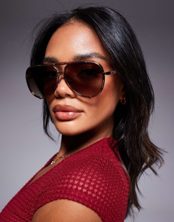 Quay high profile in clear pink with brown lens