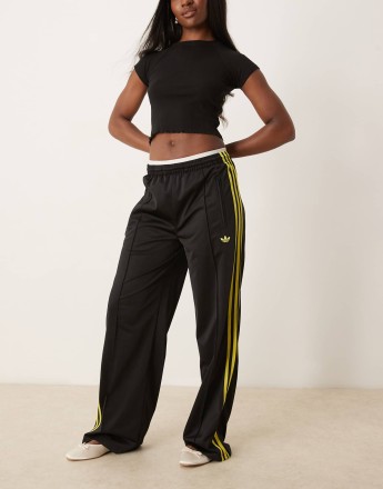 adidas Originals Firebird Loose track pants in black and yellow
