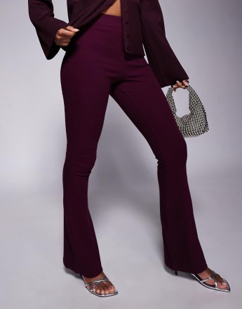 River Island fitted rib flare trouser in burgundy