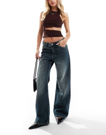 Bershka Petite baggy wide leg jeans in mid wash blue