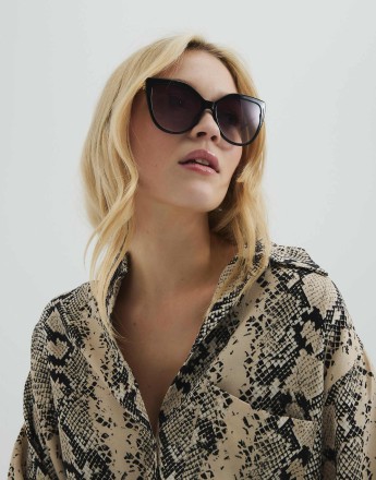 River Island Cat eye gold arm sunglasses in black