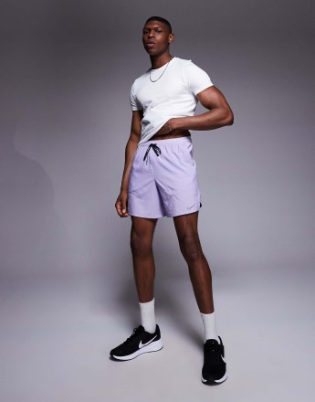 Nike Running Stride Dri-FIT 7 inch shorts in lilac