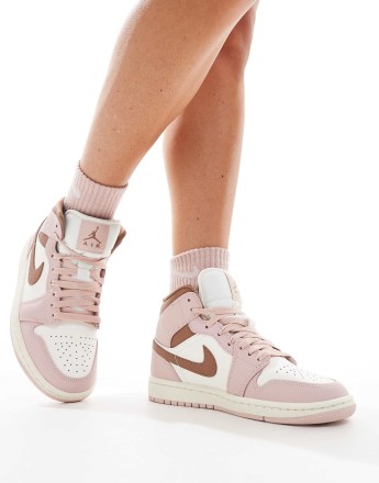 Nike Air Jordan 1 Mid trainers in pink and white