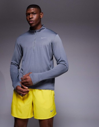 Nike Running Challenger Dri-FIT 5 inch shorts in yellow