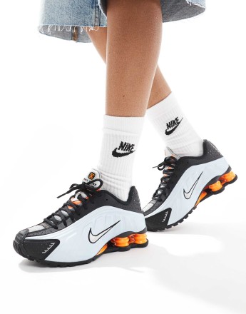 Nike Shox R4 trainers in black and metallic silver