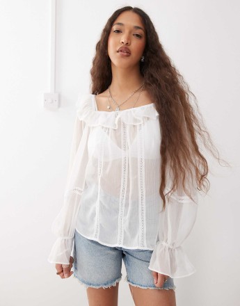 Reclaimed Vintage sheer square neck top with ruffles and lace trim in white