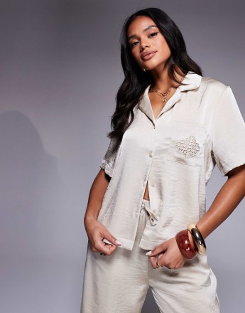 The Couture Club co-ord emblem satin shirt in beige