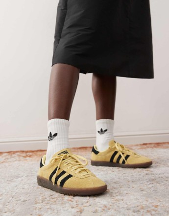 adidas Originals Bermuda trainers in yellow and black