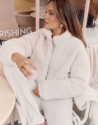 The Frolic x Bella Stovey exclusive cropped hooded borg jacket in cream