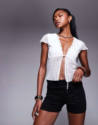 Princess Polly fold over lace mini shorts in black