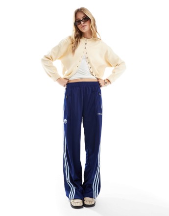 adidas Originals Firebird track pants in navy with badge