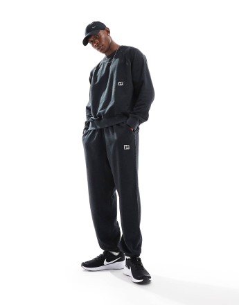 Nike Training Heritage fleece joggers in black