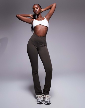 The Couture Club sculpting stretch emblem flare leggings in chocolate