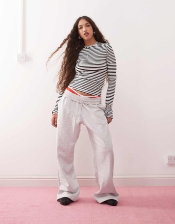 Weekday long sleeve top with flared sleeves in black and white stripe